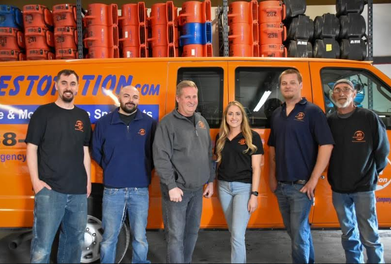 staff in front of van